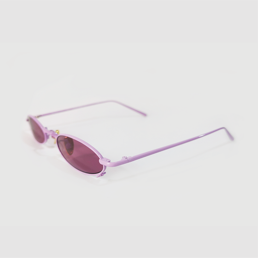 berry colour oval sunglasses in pink stainless steel frame with a tiny bug on the bottom of the right lens side shot