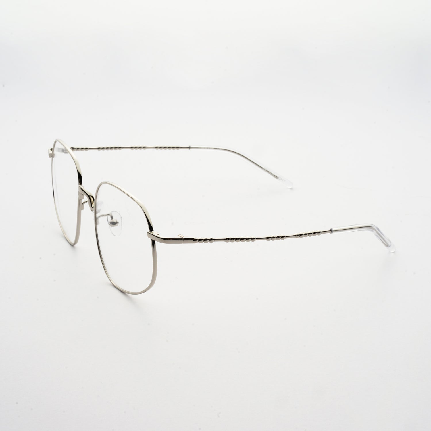 chrome colour stainless steel optical frame with morse code details on the temples 45 angled