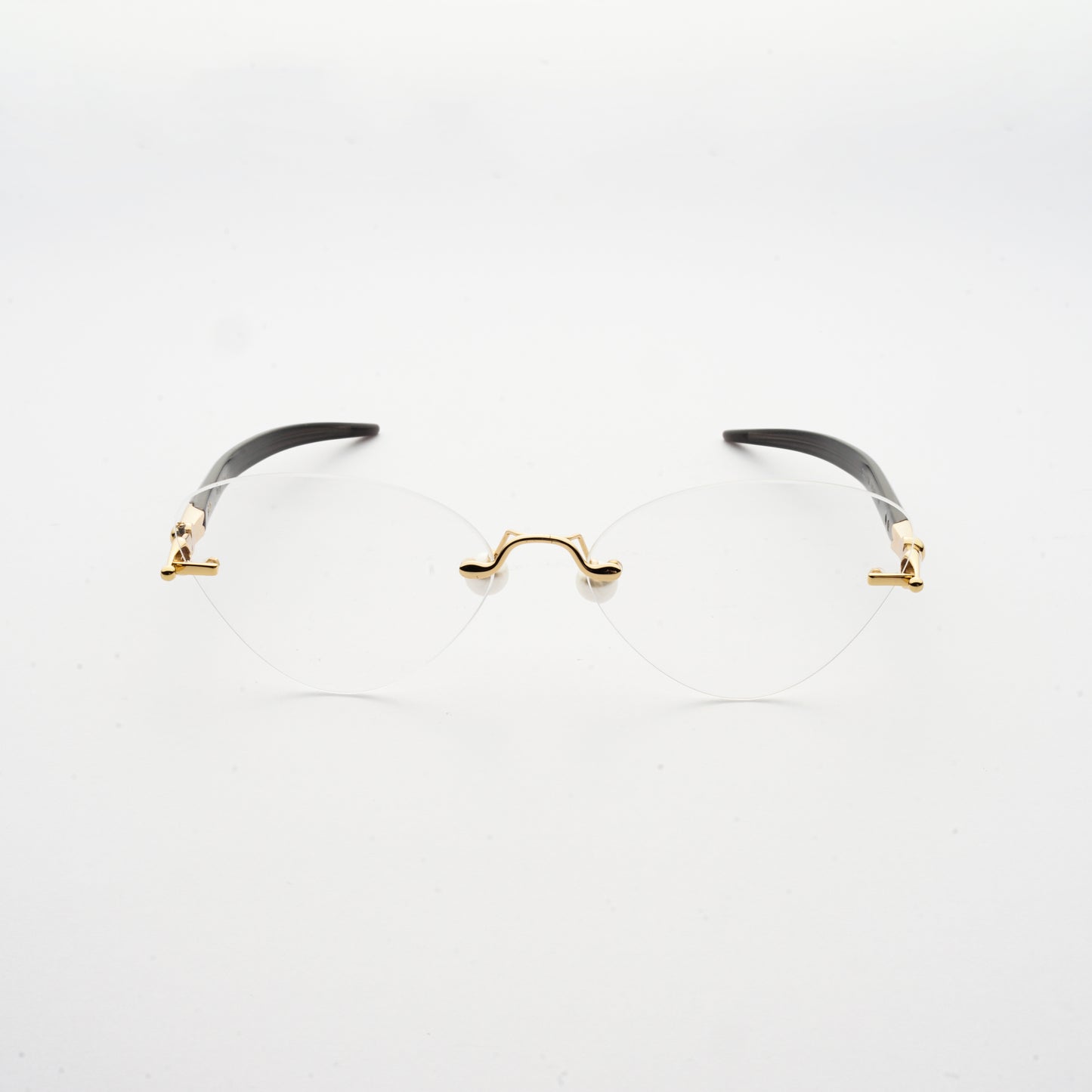 oval shaped lens with pearl nose pads and fountain pen style temples front