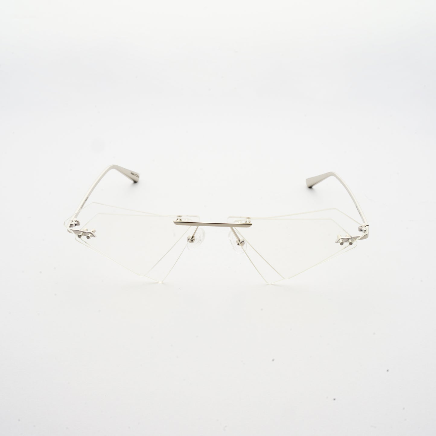 rimless sunglasses with double layered transparent lens in matrix shape and chrome colour frame front