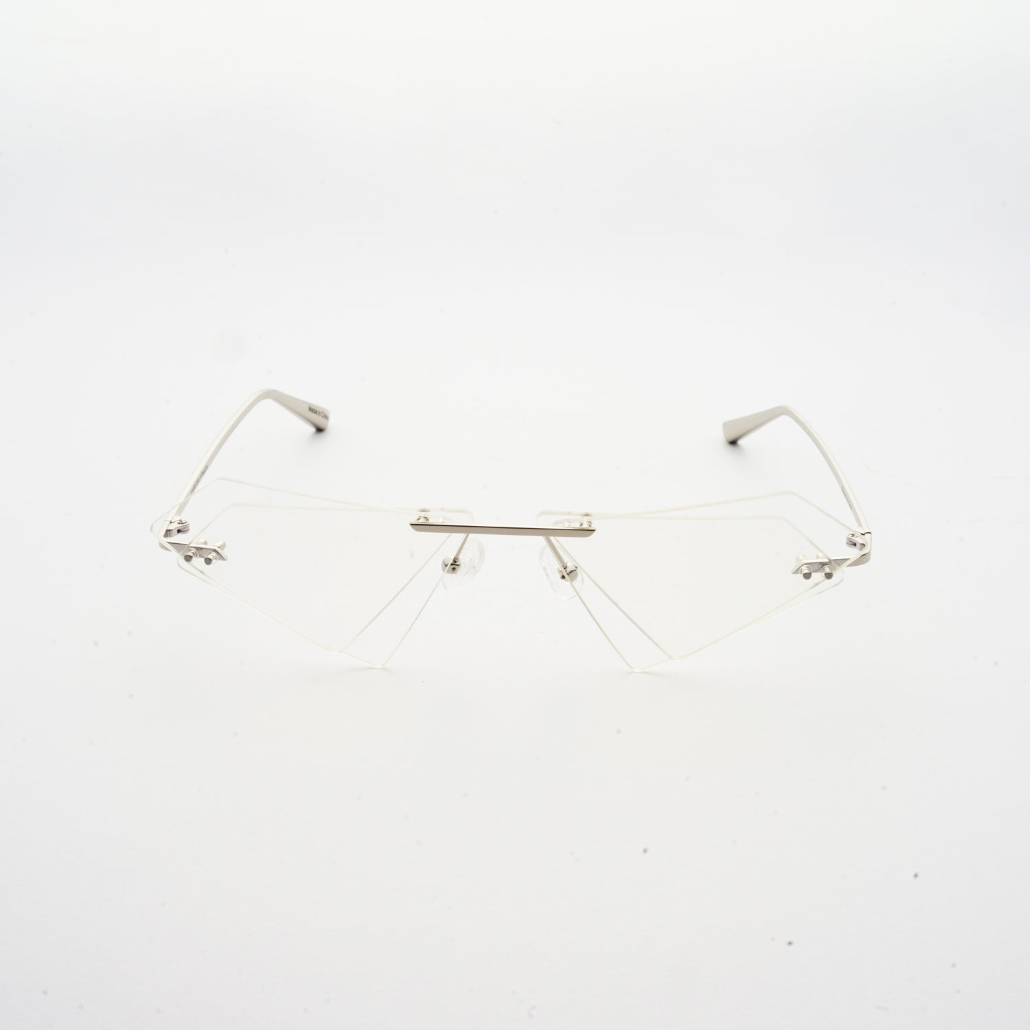rimless sunglasses with double layered transparent lens in matrix shape and chrome colour frame front