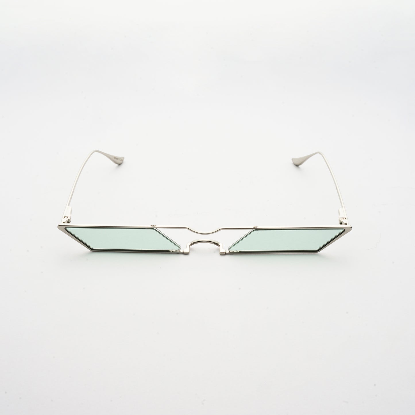 sunglasses with rhombus shaped mint lens and silver frames front