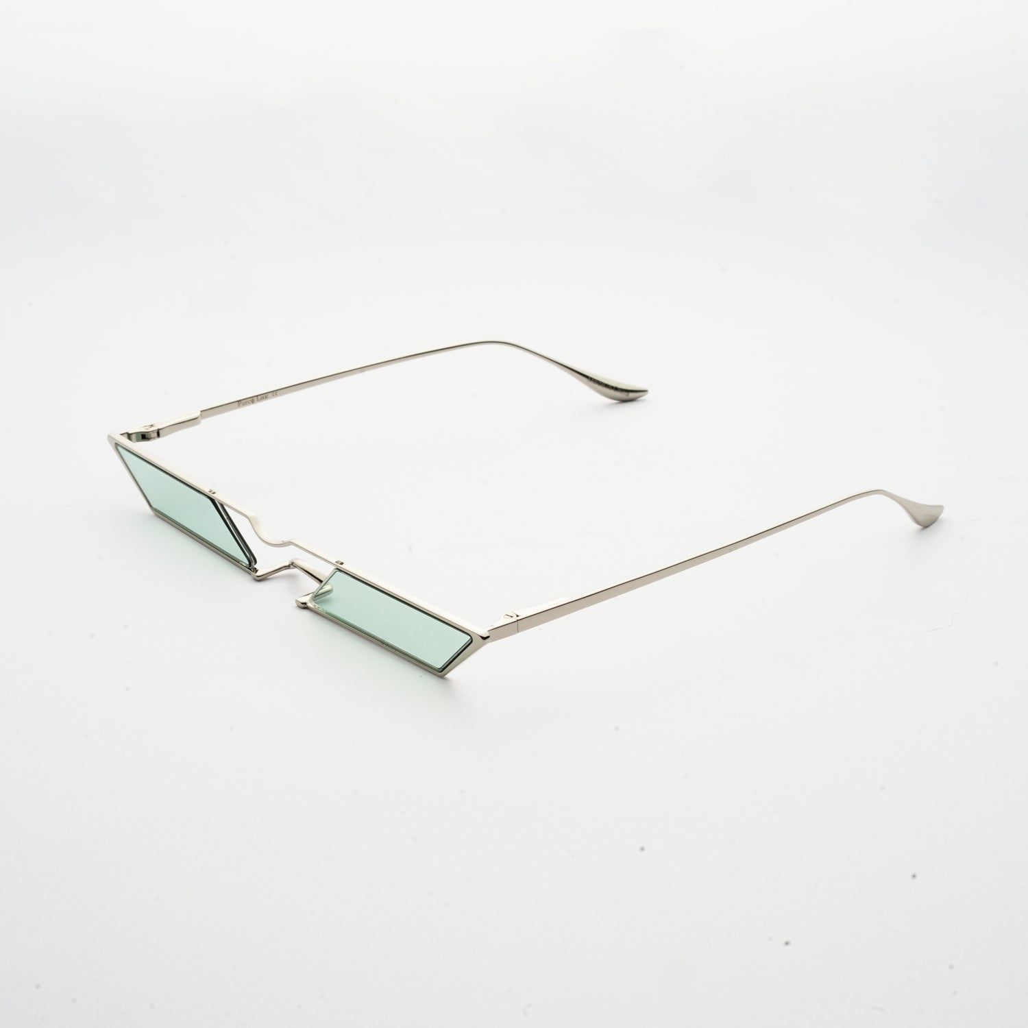 sunglasses with rhombus shaped mint lens and silver frames 45 angled