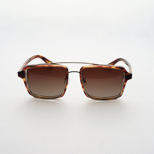 testudinarious acetate frame with crossed gold rims and gradient brown lens front