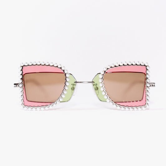 sunglasses with pearl rimmed pink windows closed and lime polaroid lens front