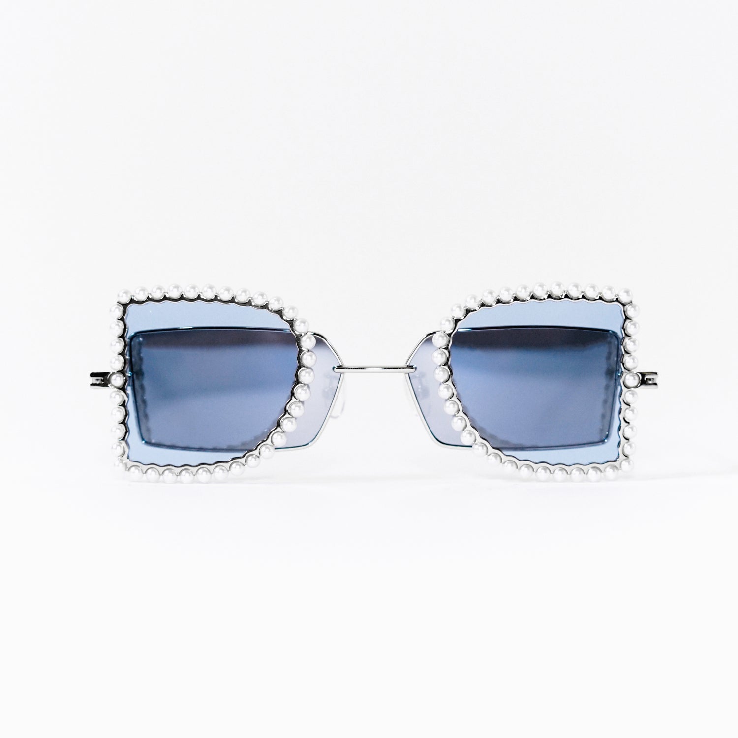 sunglasses with pearl rimmed window closed and blue polaroid lens front