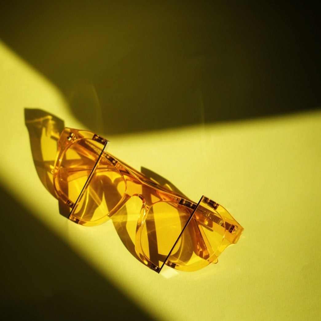 yellow jelly colour acetate frame with matching colour split polaroid lens under the sun