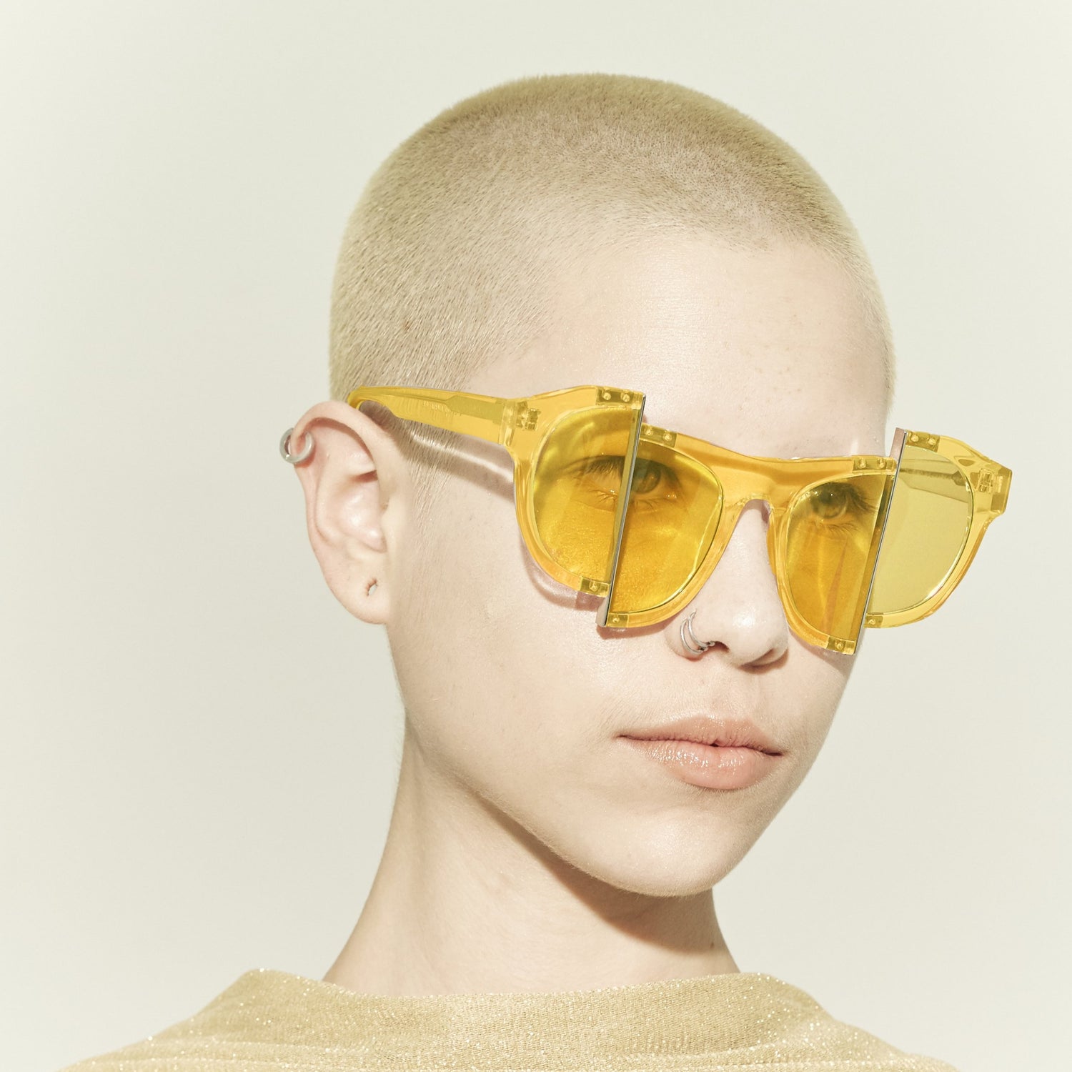 yellow jelly colour acetate frame with matching colour split polaroid lens on model 45 angled