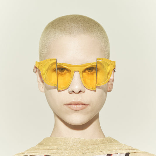 yellow jelly colour acetate frame with matching colour split polaroid lens on model front