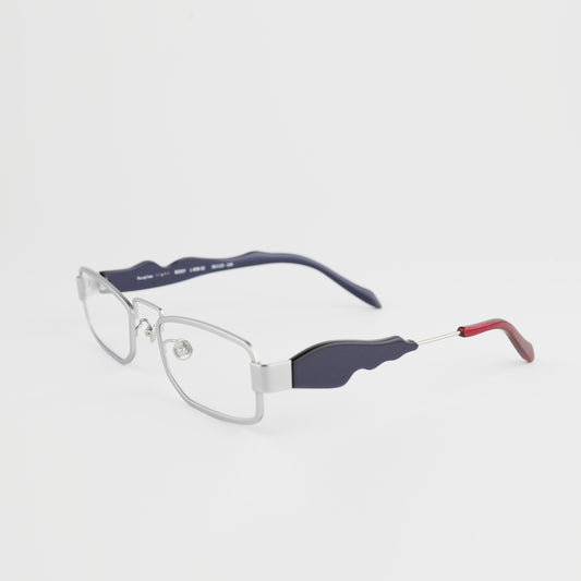 silver colour titanium rectangle optical frame with black acetate temples and a red tip 45 angled